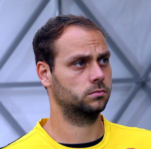Portraitfoto Rico Benatelli, Spieler vom FC St. Pauli (damals noch im gelb-schwarzen Trikot von Dynamo Dresden).